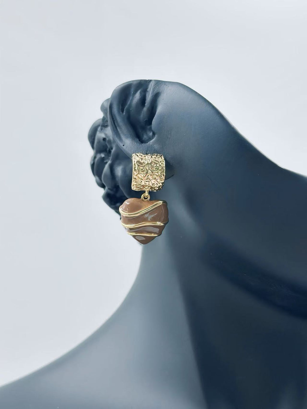Elegant Textured Drop Earrings with Artisanal Swirl Charm