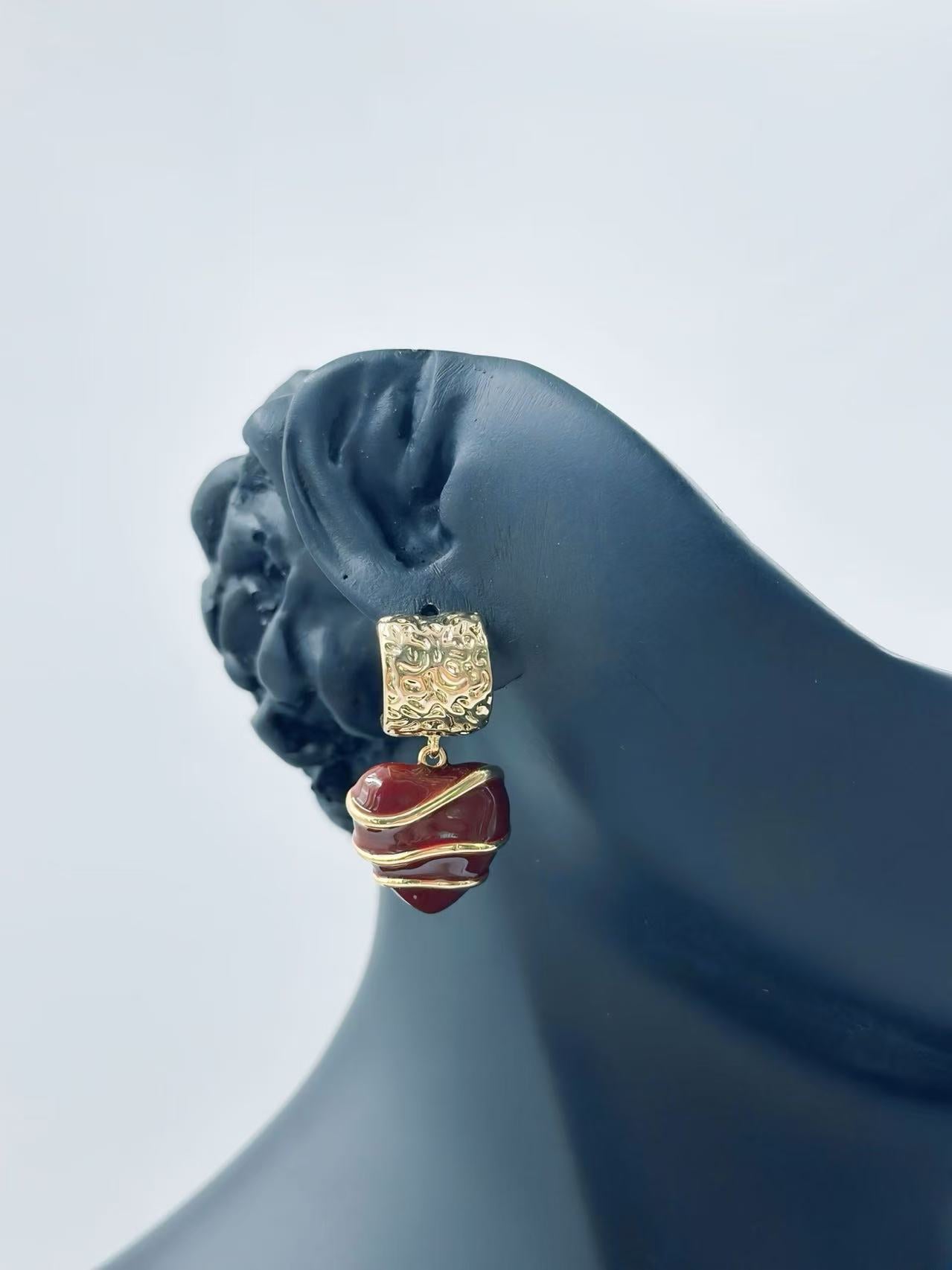 Elegant Textured Drop Earrings with Artisanal Swirl Charm