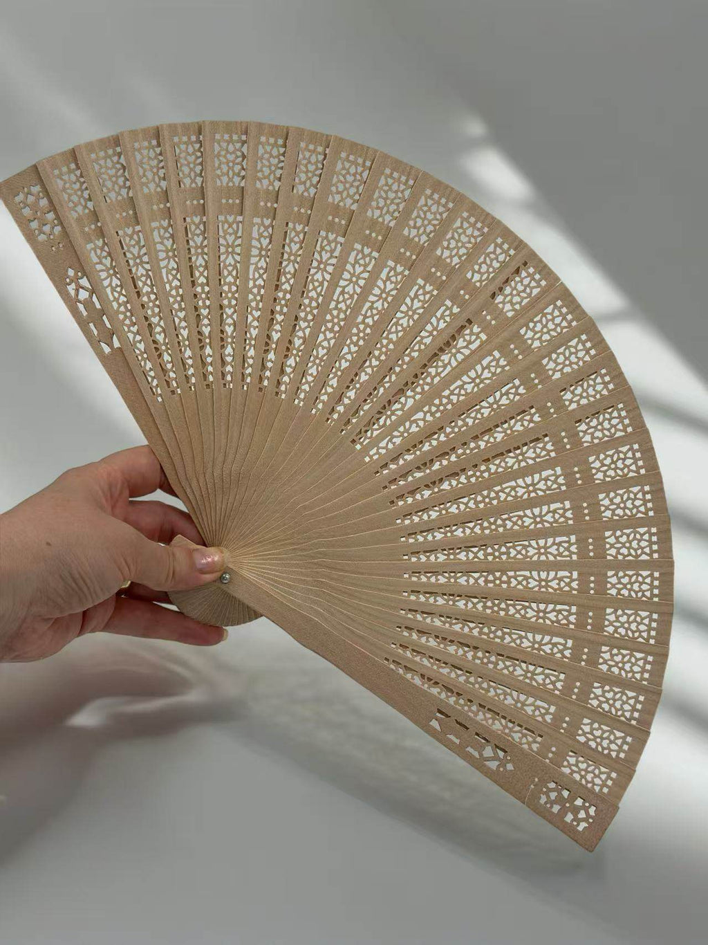 Handheld Carved Wooden Fan with Intricate Pattern (Small) - MODA ACCESSORIES