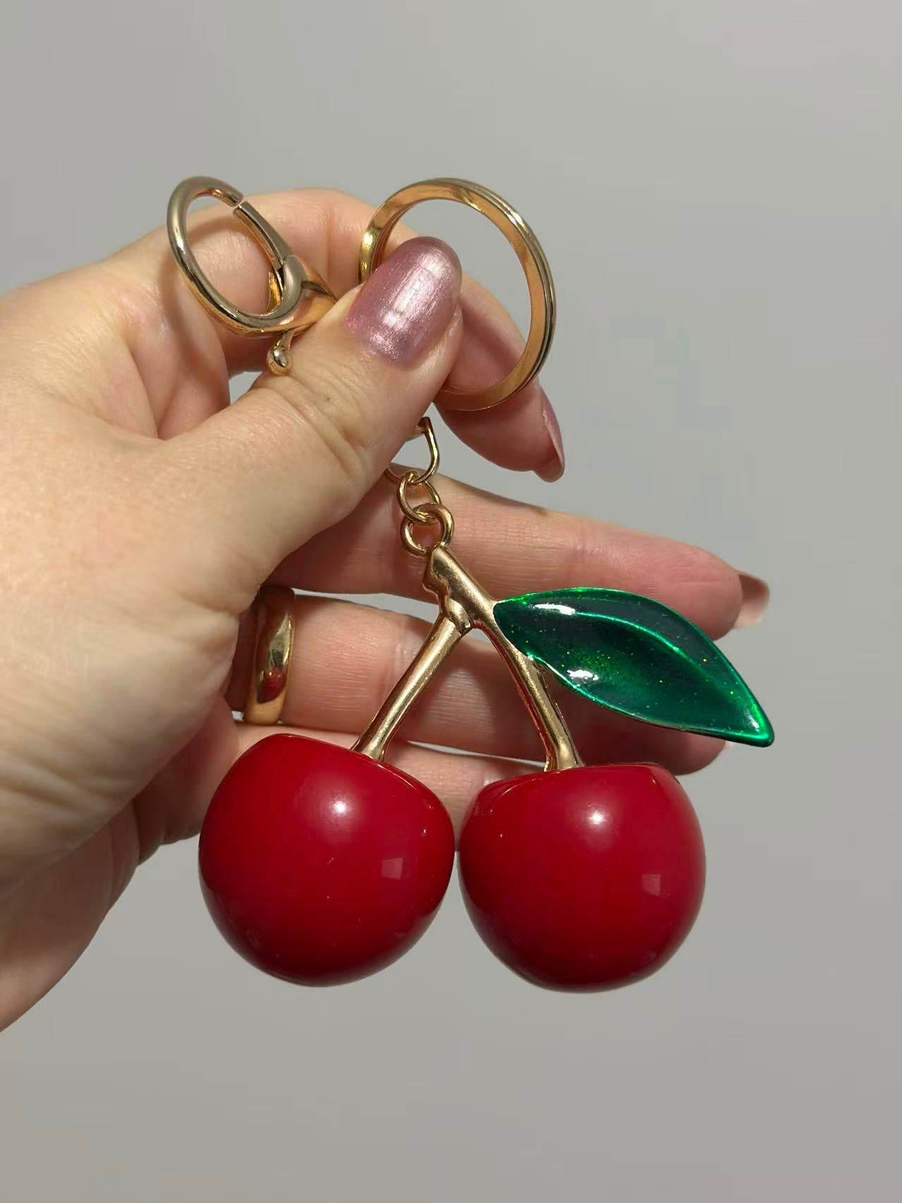 Elegant Cherry Keychain – Red Enamel Fruit Design with Green Leaf - MODA ACCESSORIES