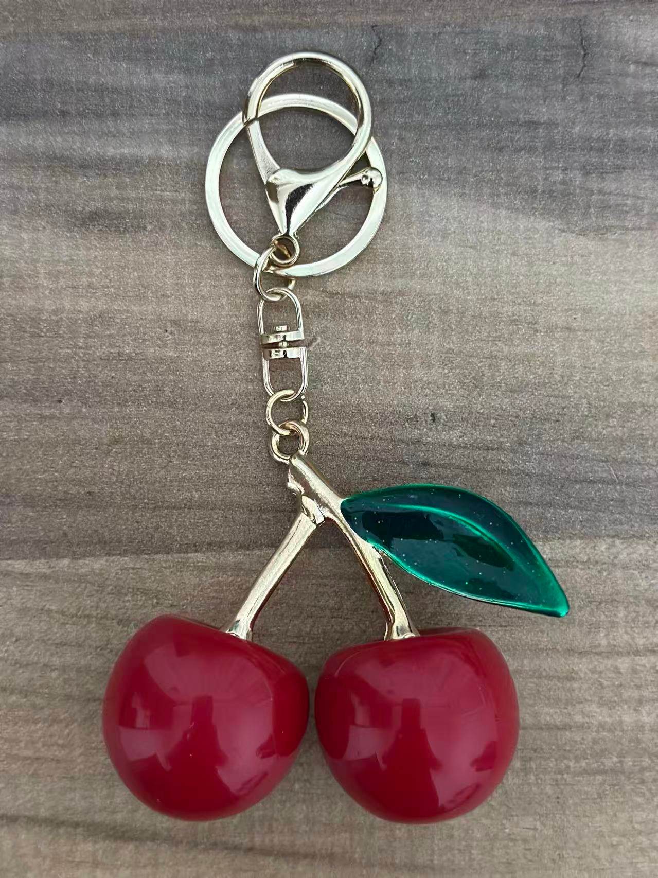 Elegant Cherry Keychain – Red Enamel Fruit Design with Green Leaf - MODA ACCESSORIES